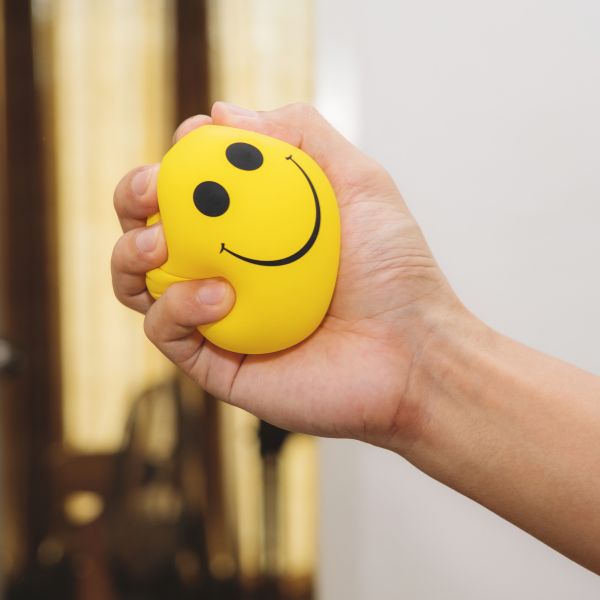 Squeezing stress ball