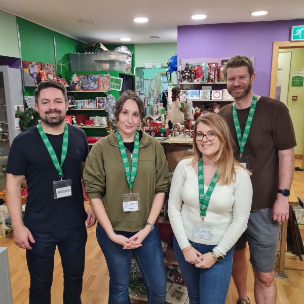 Paperstone team volunteering at HITW retail shop