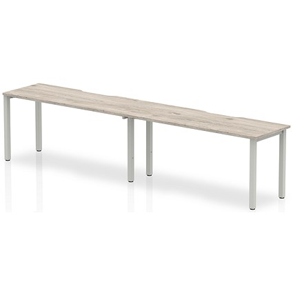 Evolve Plus 1400mm Single Row 2 Person Office Bench Desk Grey Oak Top Silver Frame Evolve Plus 1400mm Single Row 2 Person Office Bench Desk Grey Oak Top Silver Frame