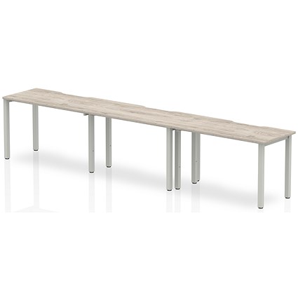 Evolve Plus 1200mm Single Row 3 Person Office Bench Desk Grey Oak Top Silver Frame Evolve Plus 1200mm Single Row 3 Person Office Bench Desk Grey Oak Top Silver Frame