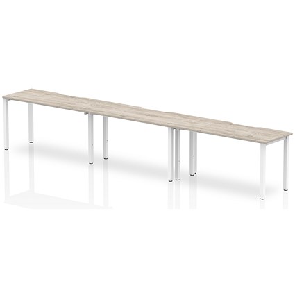 Evolve Plus 1400mm Single Row 3 Person Office Bench Desk Grey Oak Top White Frame Evolve Plus 1400mm Single Row 3 Person Office Bench Desk Grey Oak Top White Frame