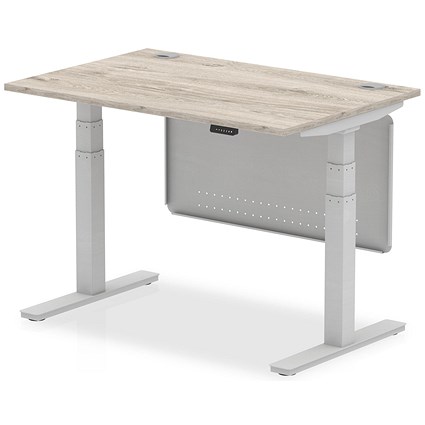 Air Modesty 1200mm Rectangular Cable Port Height Adjustable Desk, Silver Leg & Modesty Panel, Grey Oak Air Modesty 1200mm Rectangular Cable Port Height Adjustable Desk, Silver Leg & Modesty Panel, Grey Oak