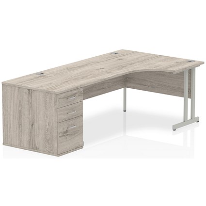 Impulse 1800mm Corner Desk with 800mm Desk High Pedestal, Right Hand, Silver Cantilever Leg, Grey Oak Impulse 1800mm Corner Desk with 800mm Desk High Pedestal, Right Hand, Silver Cantilever Leg, Grey Oak