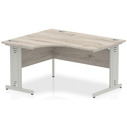 Impulse 1400mm Corner Desk, Left Hand, Silver Cable Managed Leg, Grey Oak Impulse 1400mm Corner Desk, Left Hand, Silver Cable Managed Leg, Grey Oak
