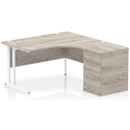 Impulse 1400mm Corner Desk with 600mm Desk High Pedestal, Right Hand, White Cantilever Leg, Grey Oak Impulse 1400mm Corner Desk with 600mm Desk High Pedestal, Right Hand, White Cantilever Leg, Grey Oak