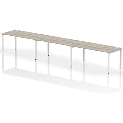 Impulse 3 Person Bench Desk, Side by Side, 3 x 1600mm (800mm Deep), White Frame, Grey Oak